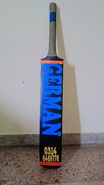 high quality full size German bat new condition. with free bat cover. 2