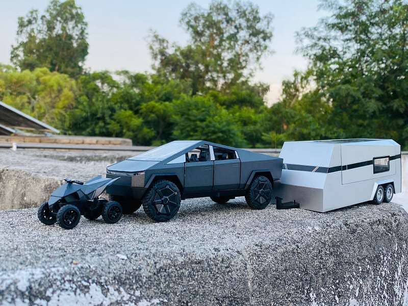 Tesla Cyber Truck with Cybersquad diecast car model up for sale. 11