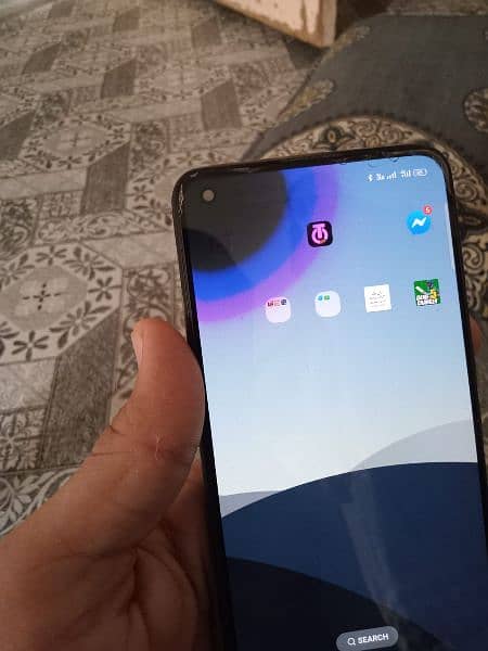 OPPO Reno 5 mobile ya bas unfortunate screen par dot aya ha 4