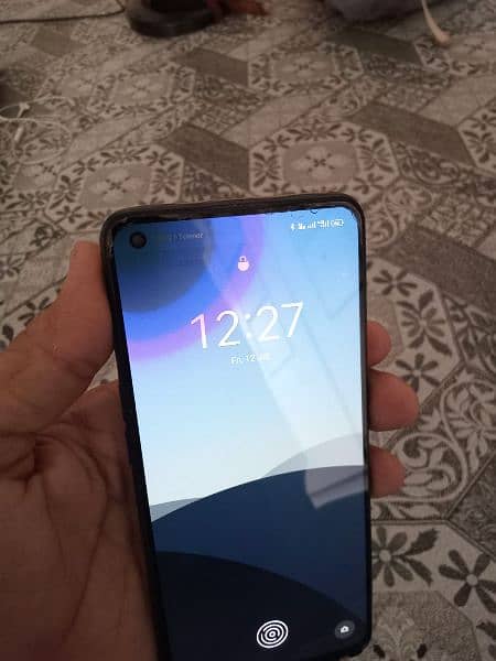 OPPO Reno 5 mobile ya bas unfortunate screen par dot aya ha 5