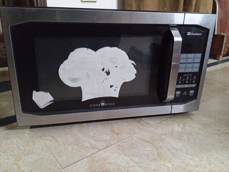 dawlance microwave oven / cooking range 0