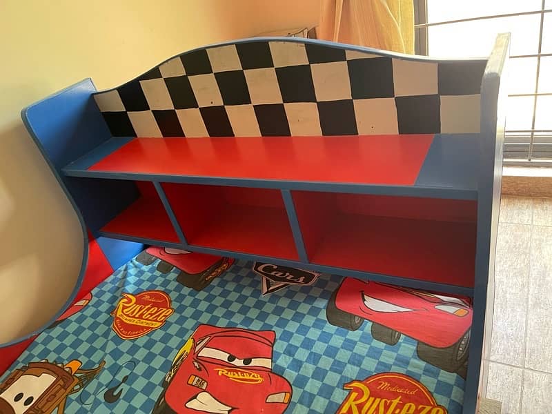 kids car bed in very good condition for sale. 1