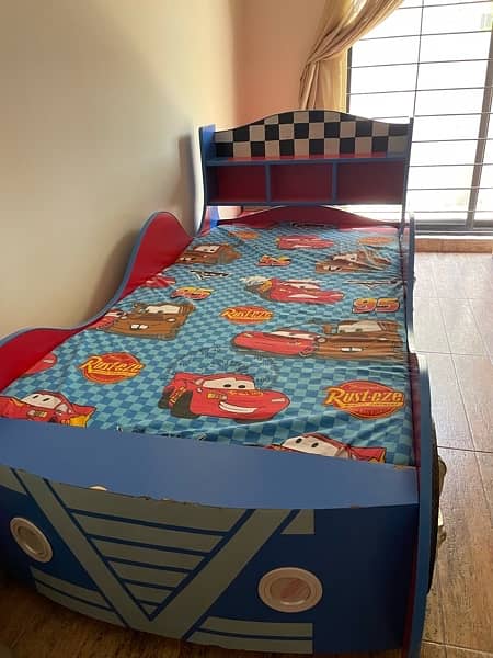 kids car bed in very good condition for sale. 2