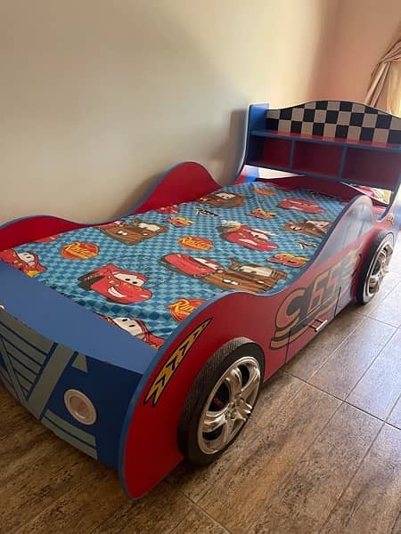 kids car bed in very good condition for sale. 3