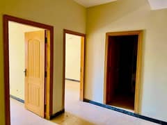 2 BEDROOM FIRST FLOOR FLAT FOR SALE F-17 ISLAMABAD ALL FACILITY AVAIB
