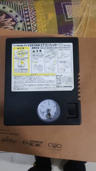 Japanese car inflator air pump compressor 1