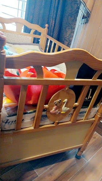 wooden baby cot with new mattress and bedcover and quilt 3