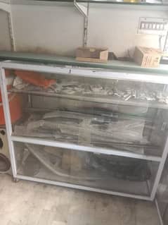 2 iron racks and shelf. . excellent condition me