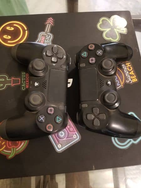 PS4 PRO WITH 4 GAMES FREE AND TWO CONTROLLERS FREE 3