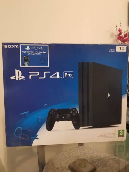 PS4 PRO WITH 4 GAMES FREE AND TWO CONTROLLERS FREE 4