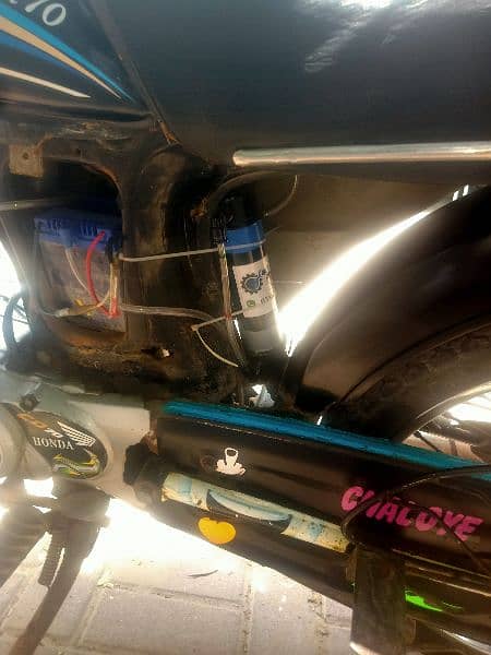hybrid bike petrol+water Device installed . 5