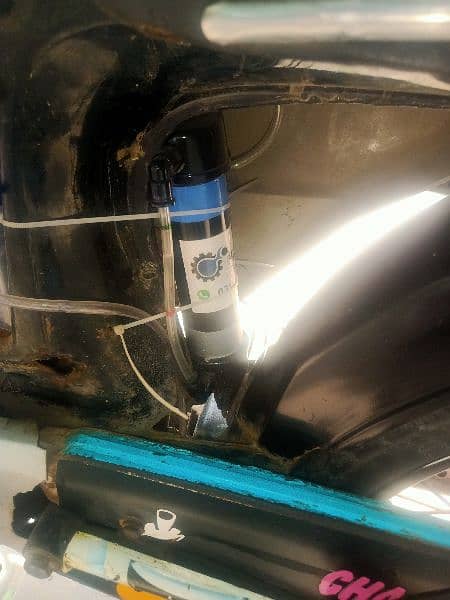 hybrid bike petrol+water Device installed . 9