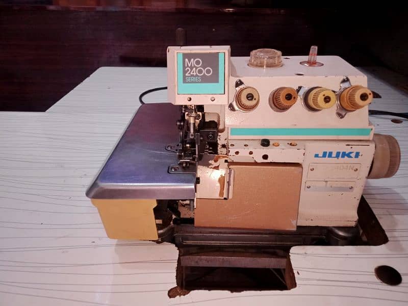 juki modle 781 kaj 10/10 condition and overlock machen model2400 0