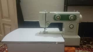 sewing+embroidery machine singer company