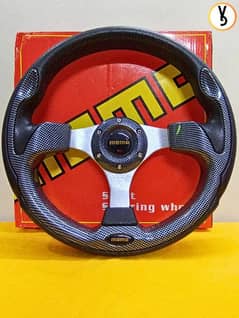 BRAND NEW MOMO STEERING WHEEL (IN CARBON FIBER) AVAILABLE FOR SALE