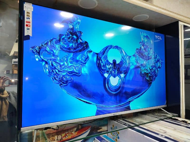 65. INCH Q LED ANDROID MODEL. 3. YEAR WARRANTY. 03444819992 4