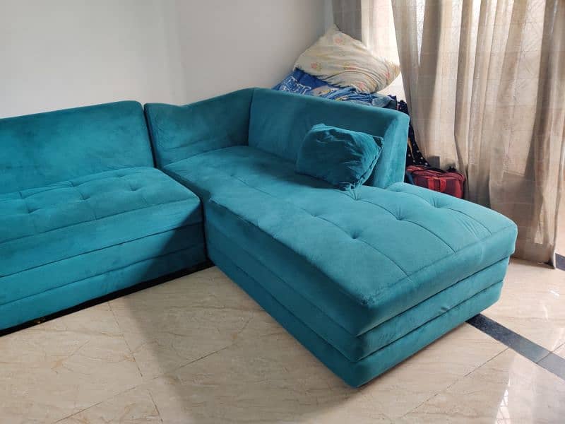 Blue L-shaped sofa 1