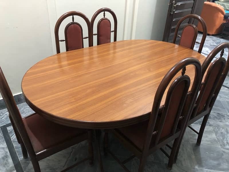 6 seater wooden dinning table in good condition 0