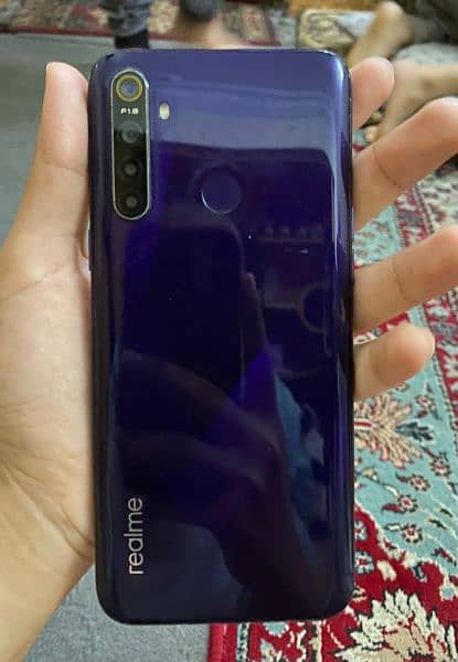 Realme 5 4gb ram and 128gb storage 03171436161 is my WhatsApp number 3