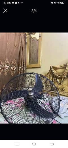 mega wall bracket fan sweeps "24" like new price 6000