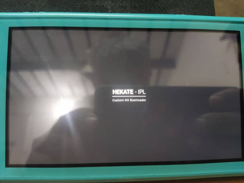 Nintendo Switch Lite (Modded)+64GB Card Full of Games in Clean Cond 10