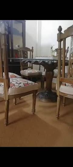 dining table with 6 chairs 10mm glass top in good condition