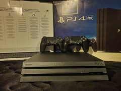 PS4 PRO With 2 Controllers & 200 Games