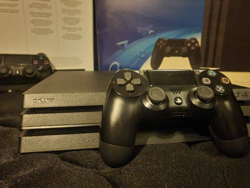 PS4 PRO With 2 Controllers & Many Games 3