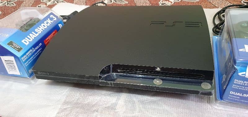 ps3 500gb/45 gsmes installed with 2 remotes wirelless 2