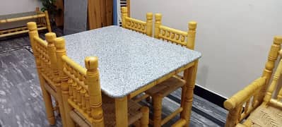 4 chair dinner table with granite imperial white top