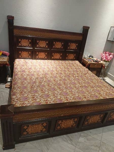 Beautiful wooden double bed with side table 0