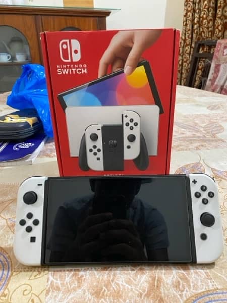 NITENDO SWITCH OLED VERSION BRAND NEW 0