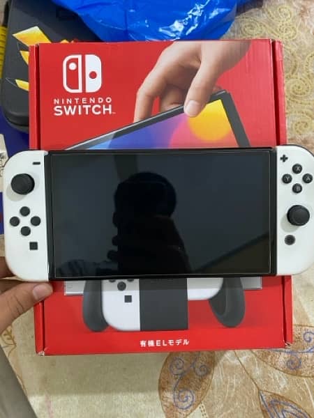 NITENDO SWITCH OLED VERSION BRAND NEW 12