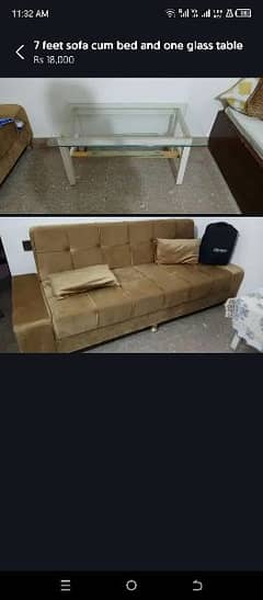 7 feet sofa cum bed and one glass table