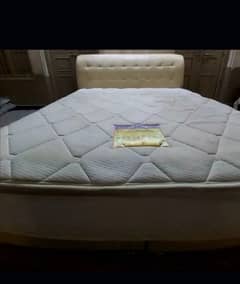 queen bed with side tables and matres use like new one month use only