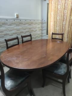 wooden dining table with 6 chairs