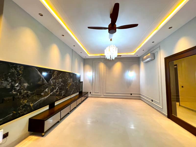 "Magnificent 26.5-Marla Semi-Furnished Bungalow with Spacious Basement, 5 Beds, 7 Baths, 2 Kitchens, and Stylish Living Spaces in DHA Phase 8 Block T - A Must-See Property!" 8