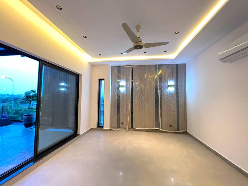 "Magnificent 26.5-Marla Semi-Furnished Bungalow with Spacious Basement, 5 Beds, 7 Baths, 2 Kitchens, and Stylish Living Spaces in DHA Phase 8 Block T - A Must-See Property!" 15