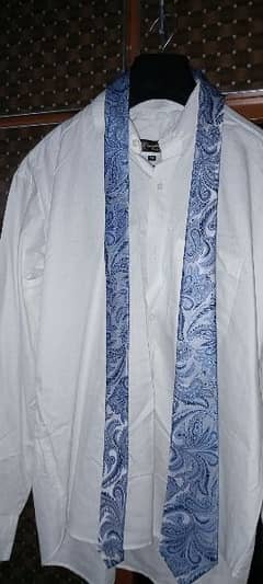 pent coat with shirt, tie, weyskot and broche