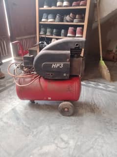 Imported Air Compressor with Gun and Pipe.