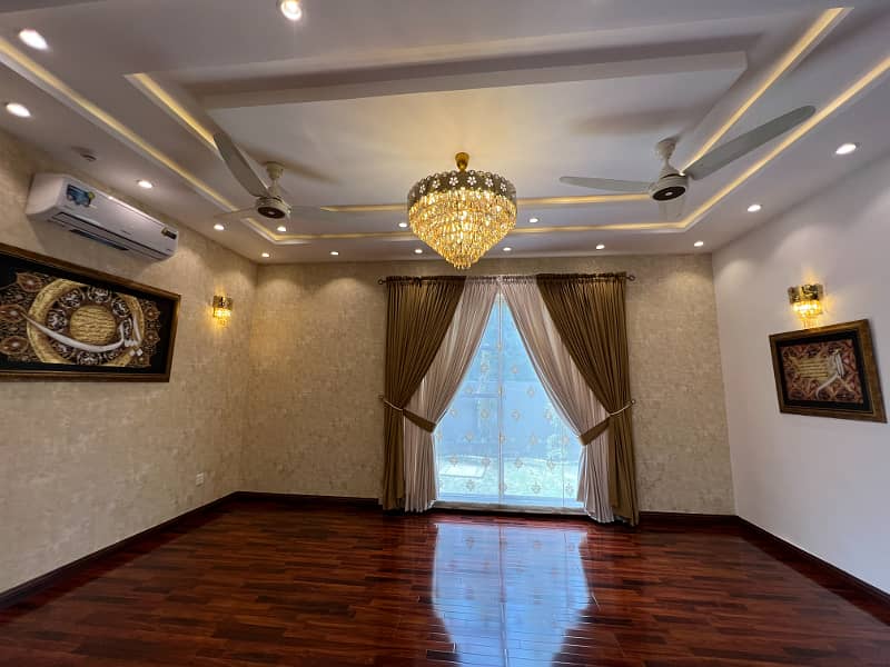 Luxurious Semi Furnished 1 Kanal Corner House In Sector V, DHA Phase 2, Lahore Elegance And Comfort Await In This Fully Furnished 1 Kanal Home, Sector V, DHA Phase 2, Lahore. 11