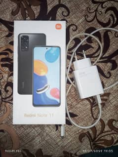 Xiaomi redmi note 11 with original fast charger and box.