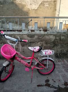 cycle for girl kids in good condition pink color