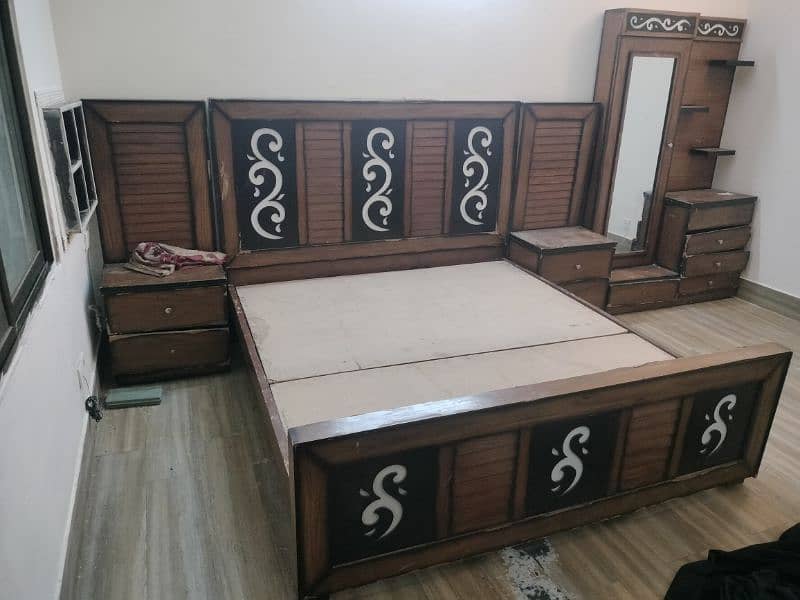 king size bed with side table and dressing table 0