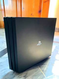 box pack ps 4 pro 1Tb one year used urgent sale dilvery possible ha