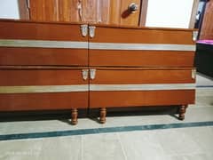 2 wooden single beds