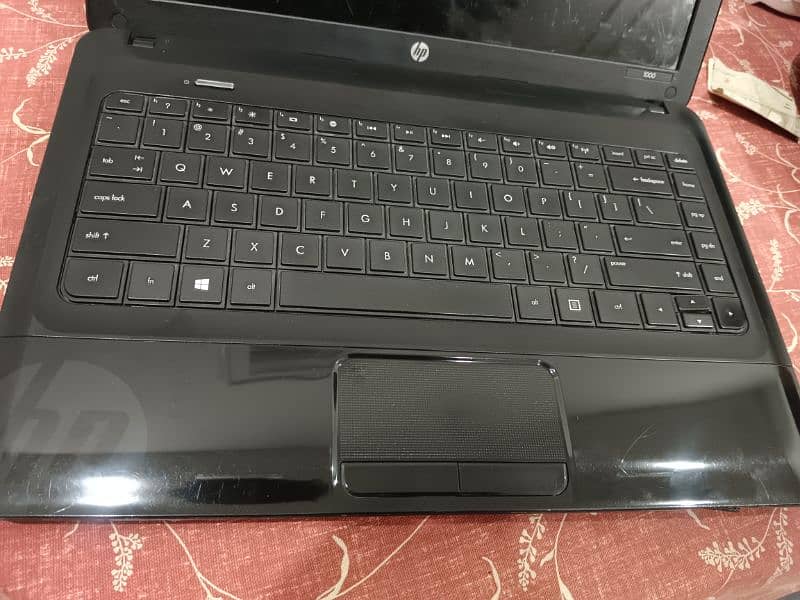 HP 1000 Laptop 7