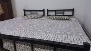 Iron bed with mattress