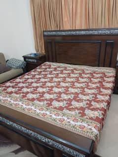Used bed  with side tables but wIthout mattress