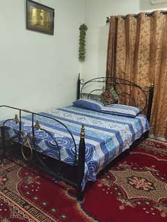 Iron double bed with 2 side tables